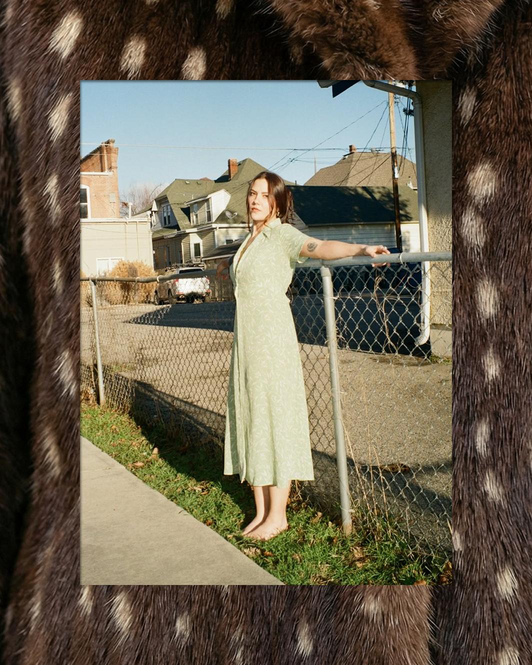 A branded template to display photos as part of Corner Booth's digital portfolio, with a doe fur background