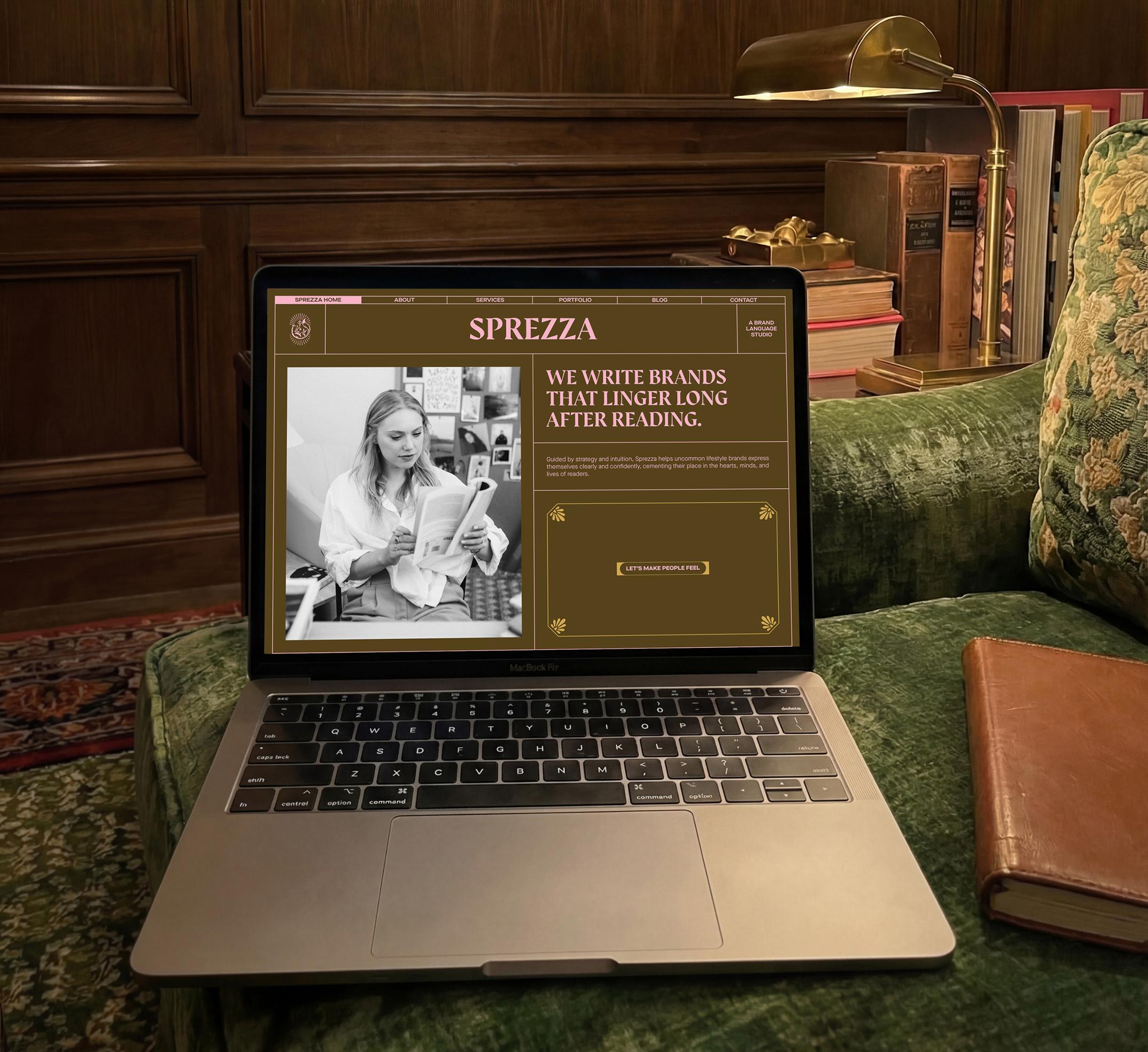 Mockup of Sprezza's homepage on a MacBook in a cozy, sophisticated home library